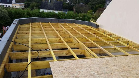 Photo de charpente en bois pour toit plat